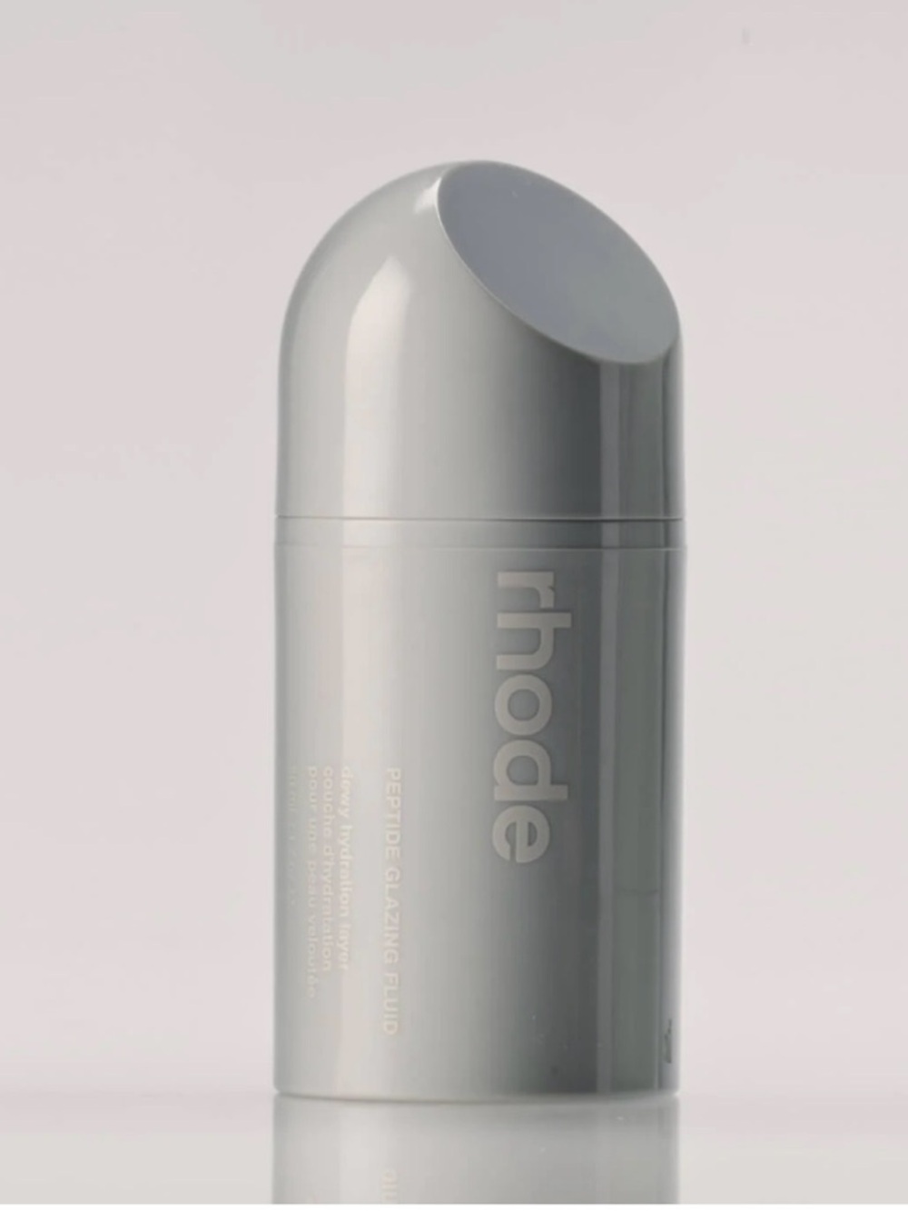 RHODE Peptide Glazing Fluid - Light Gray Gloss Bottle